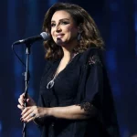 الفنانة أنغام في إحدى حفلاتها (غيتي)