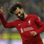 محمد صلاح سعيد بفوز فريقه ليفربول (رويترز)