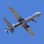 مسيرة أميركية MQ-9 Reaper، كالتي أسقطتها مقاتلة روسية، تحلق فوق قاعدة كريش الجوية في نيفادا (رويترز)