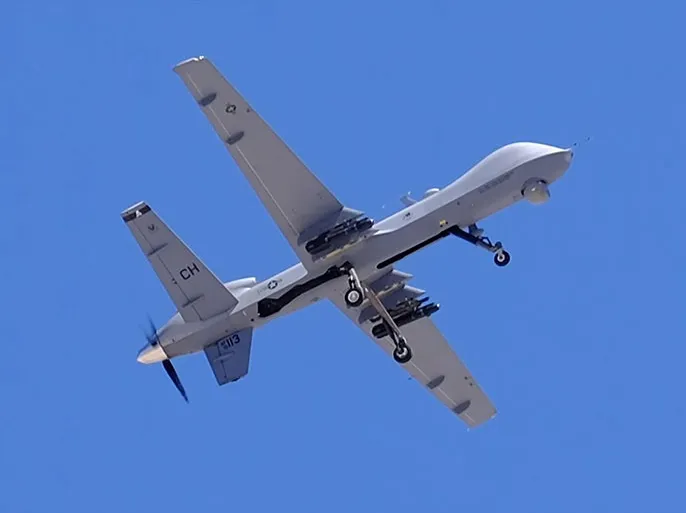 مسيرة أميركية MQ-9 Reaper، كالتي أسقطتها مقاتلة روسية، تحلق فوق قاعدة كريش الجوية في نيفادا (رويترز)